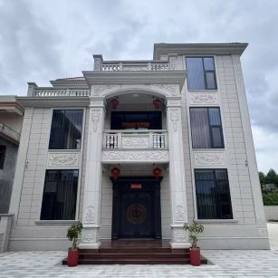 盘锦 芝麻白石材别墅干挂案例展示